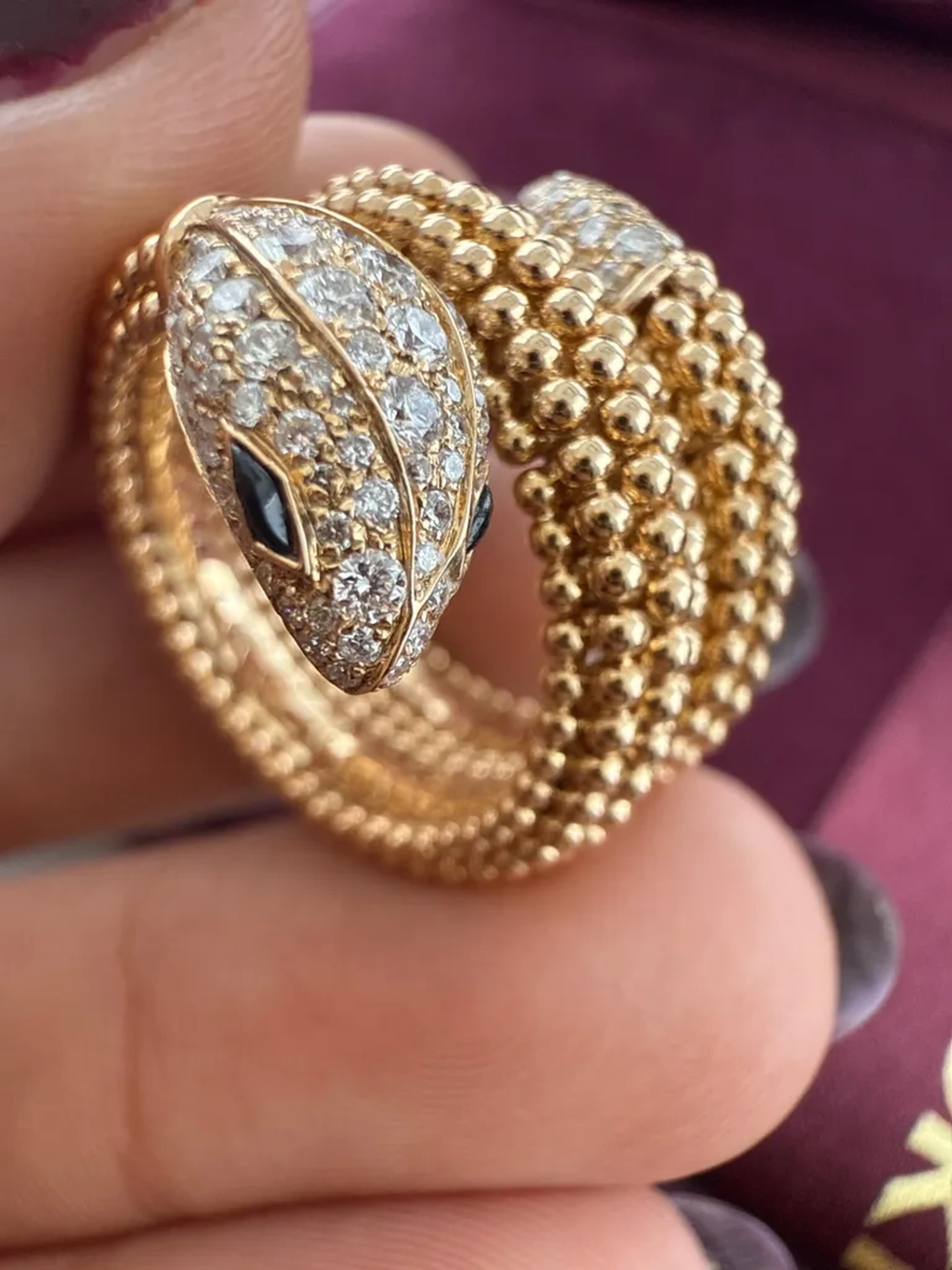 Anel serpente em ouro rose 18k com diamantes imagem