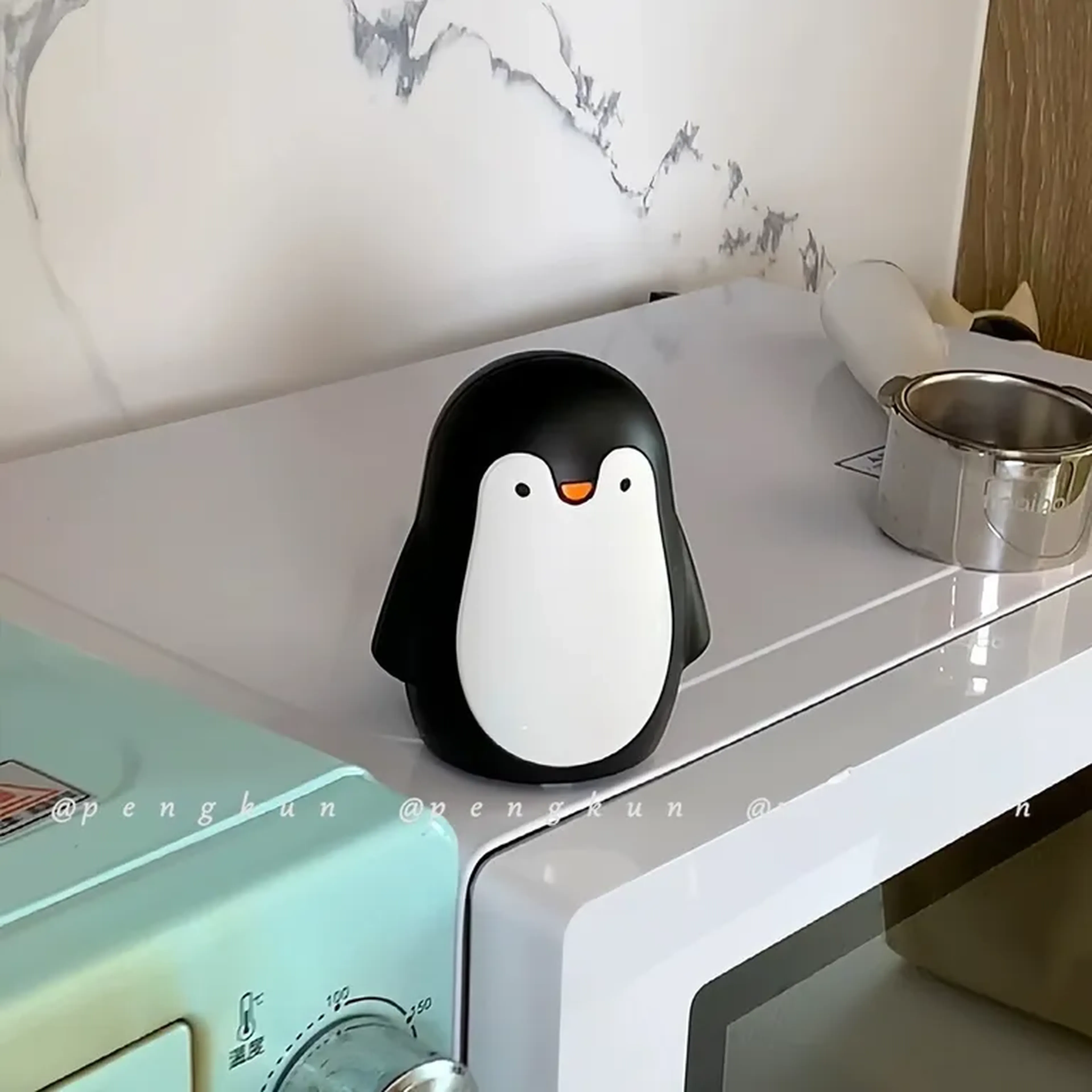 Abridor 2 em 1 Inox em formato de Pinguin imagem
