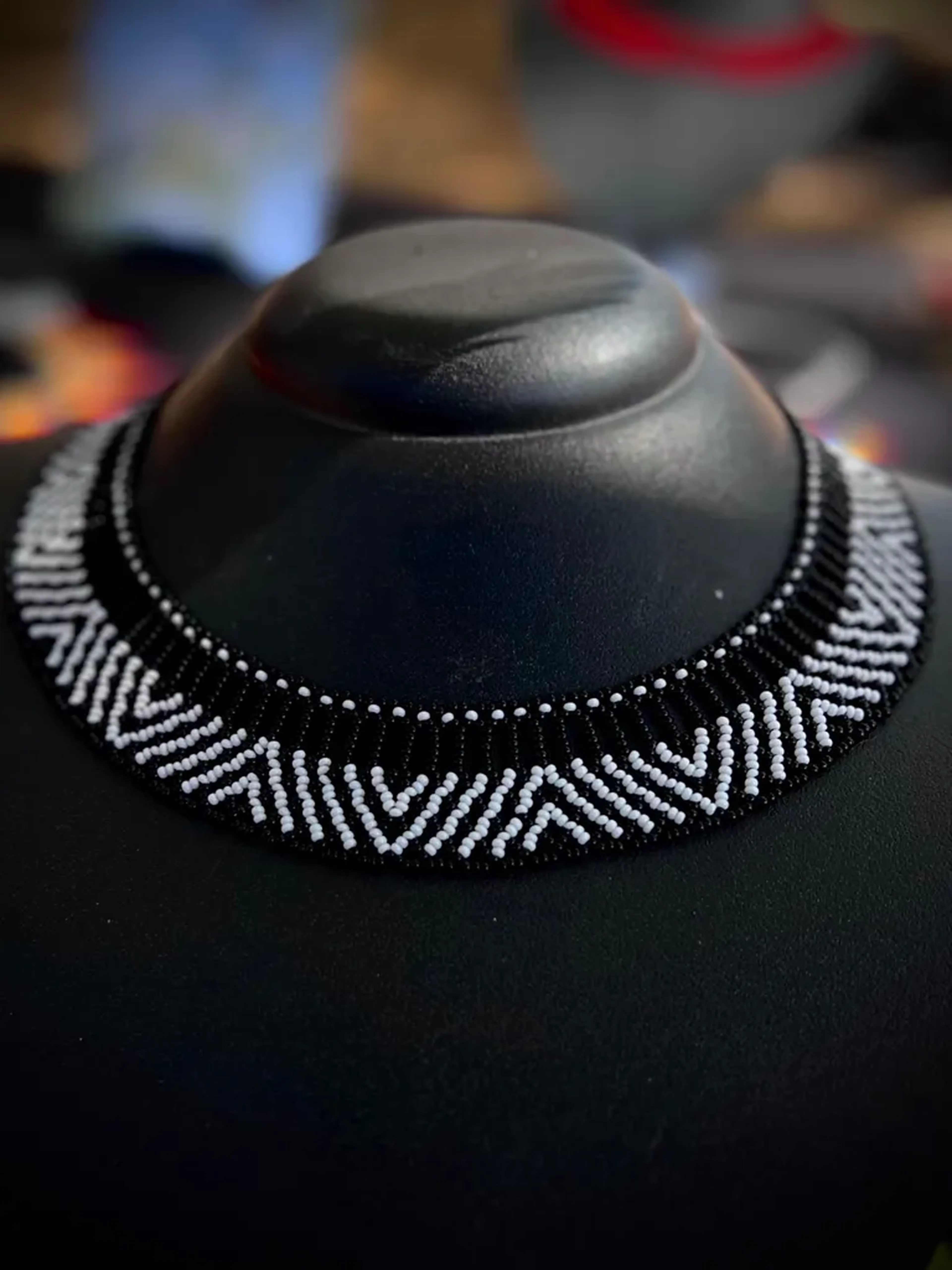 Colar grafismo jiboia imagem