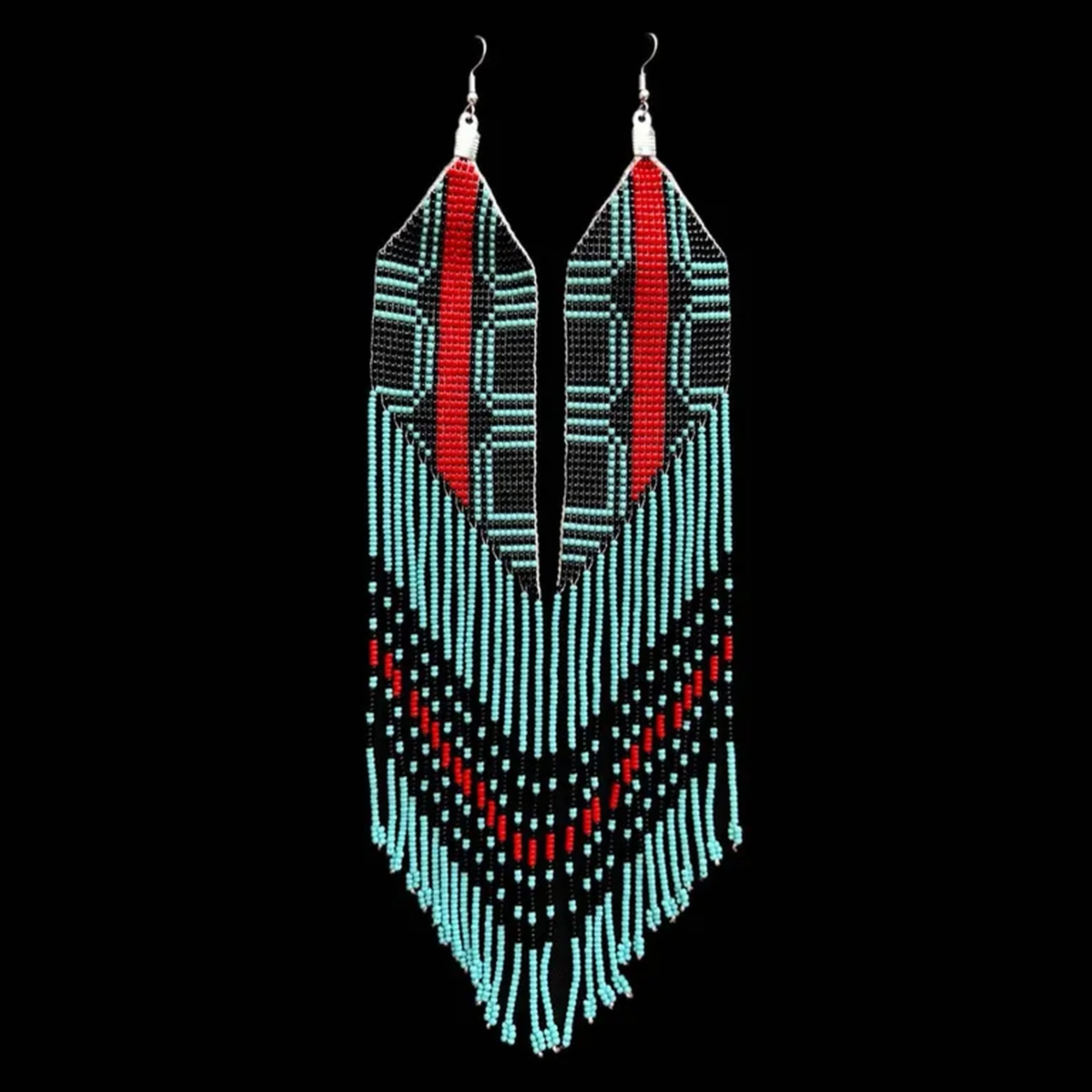 brinco Com grafismo do Kuarup, fundo azul claro imagem