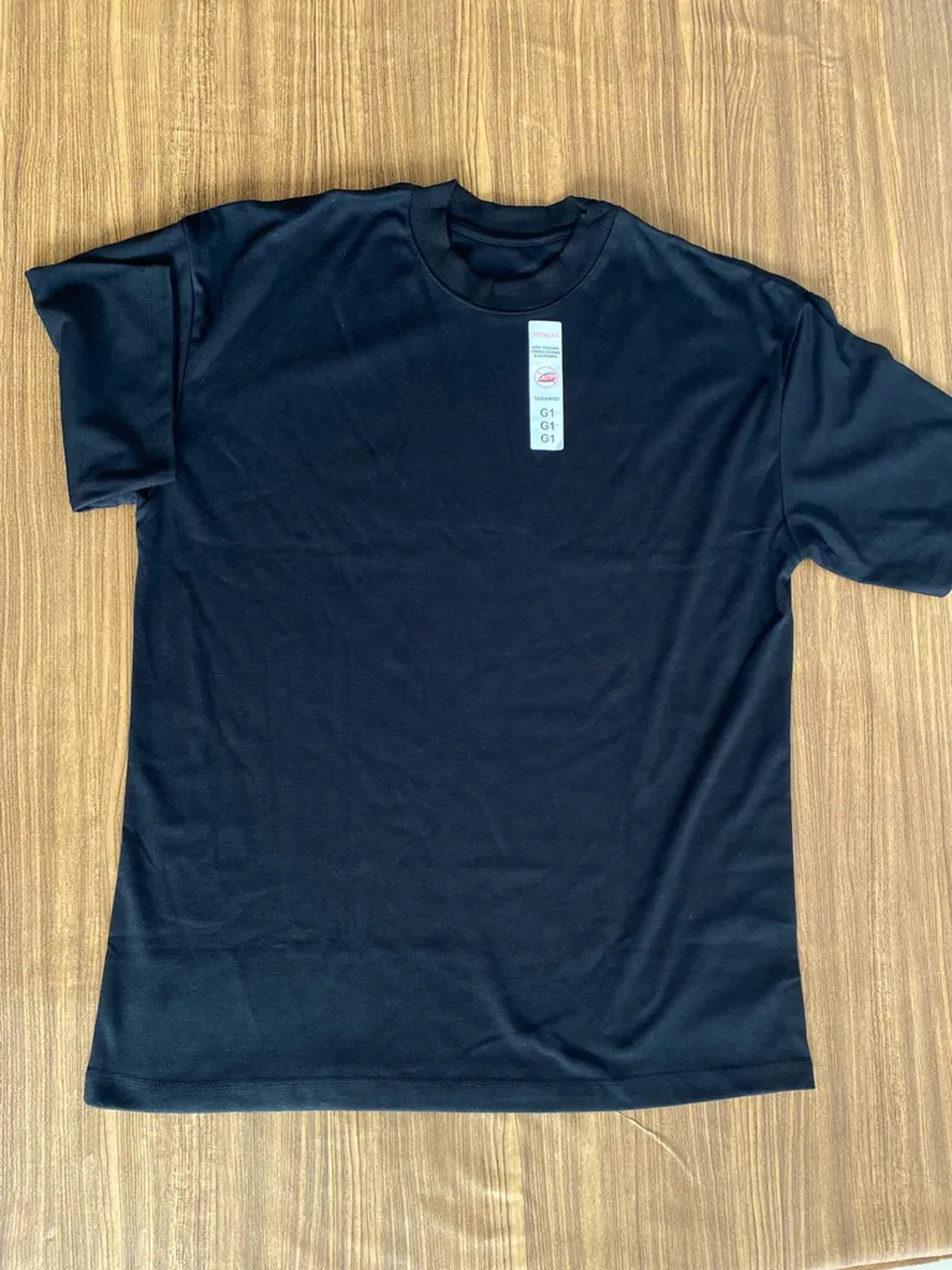 camisa oversaid lisa preta G1 imagem