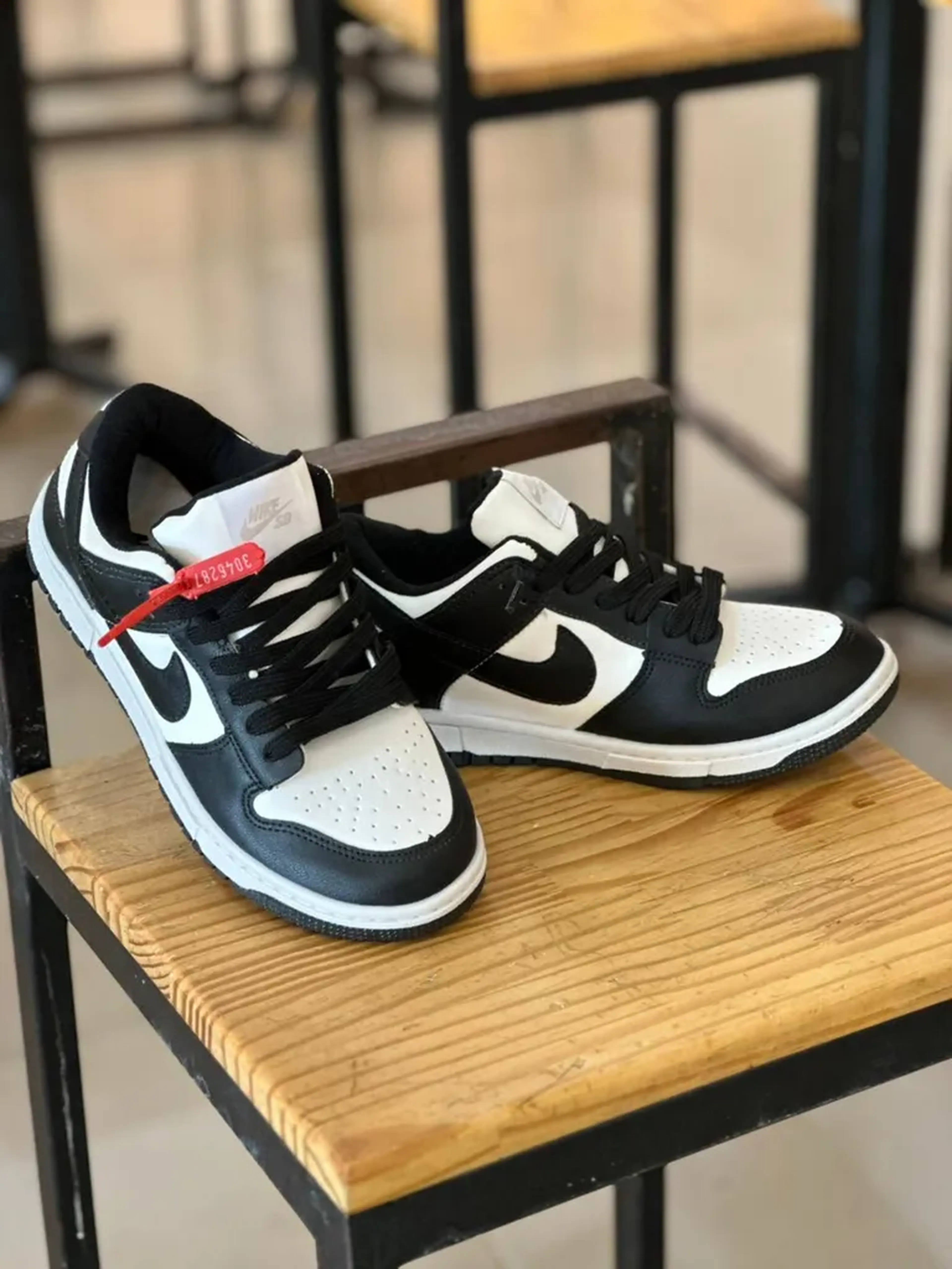 Tênis Nike Dunk Low Retro Panda imagem