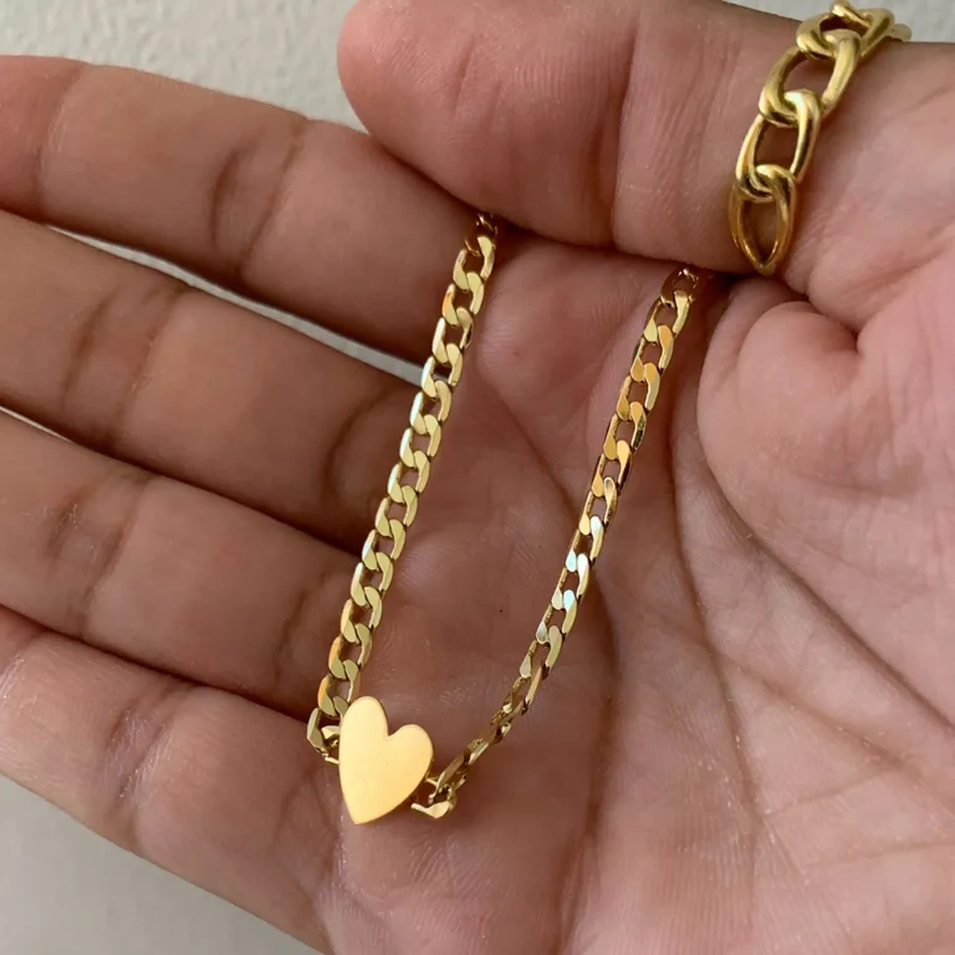 Chocker dourada de coração imagem