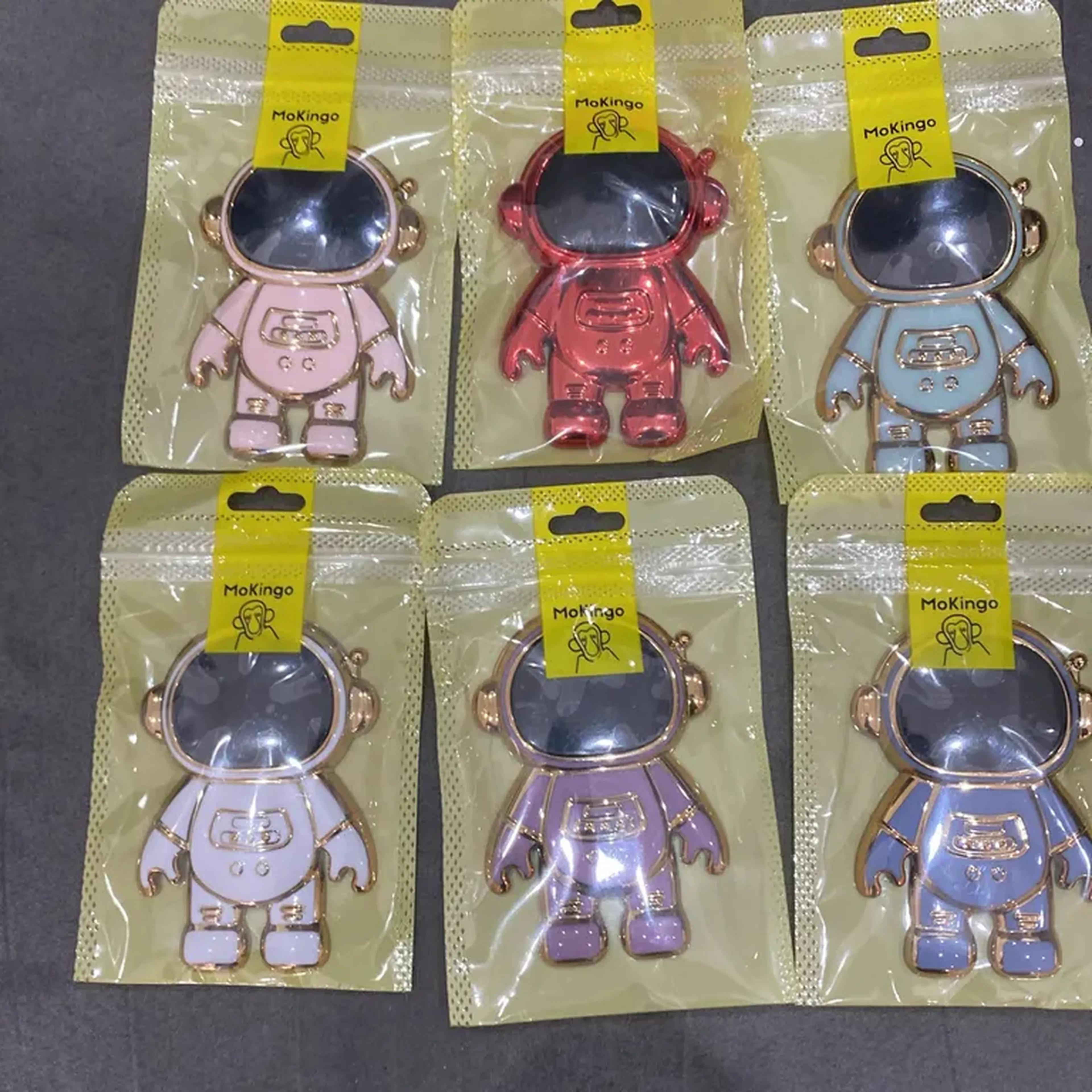 suporte para celular em formato de astronauta da marca MoKingo imagem