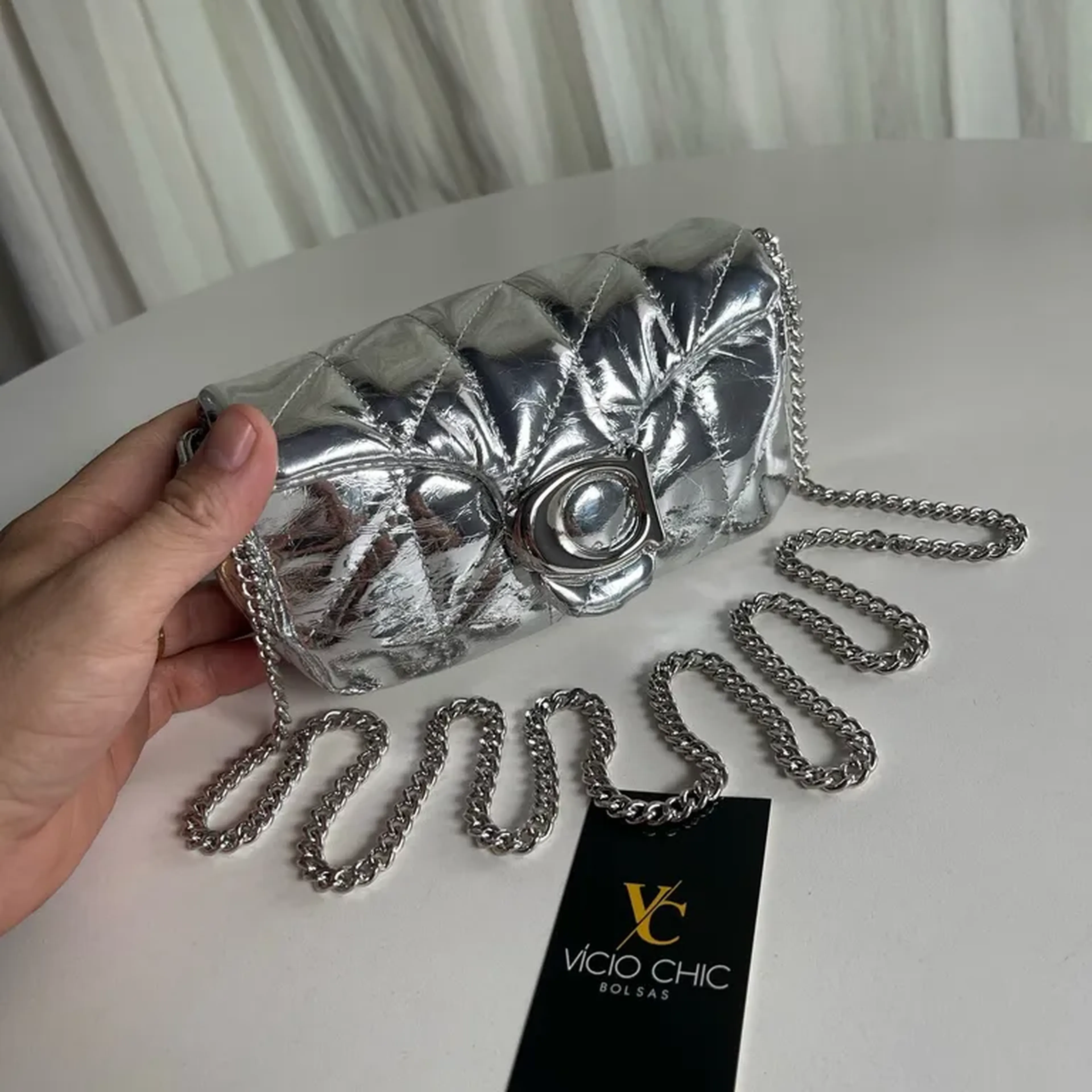 Bolsa Inspiração Coach verniz prata imagem