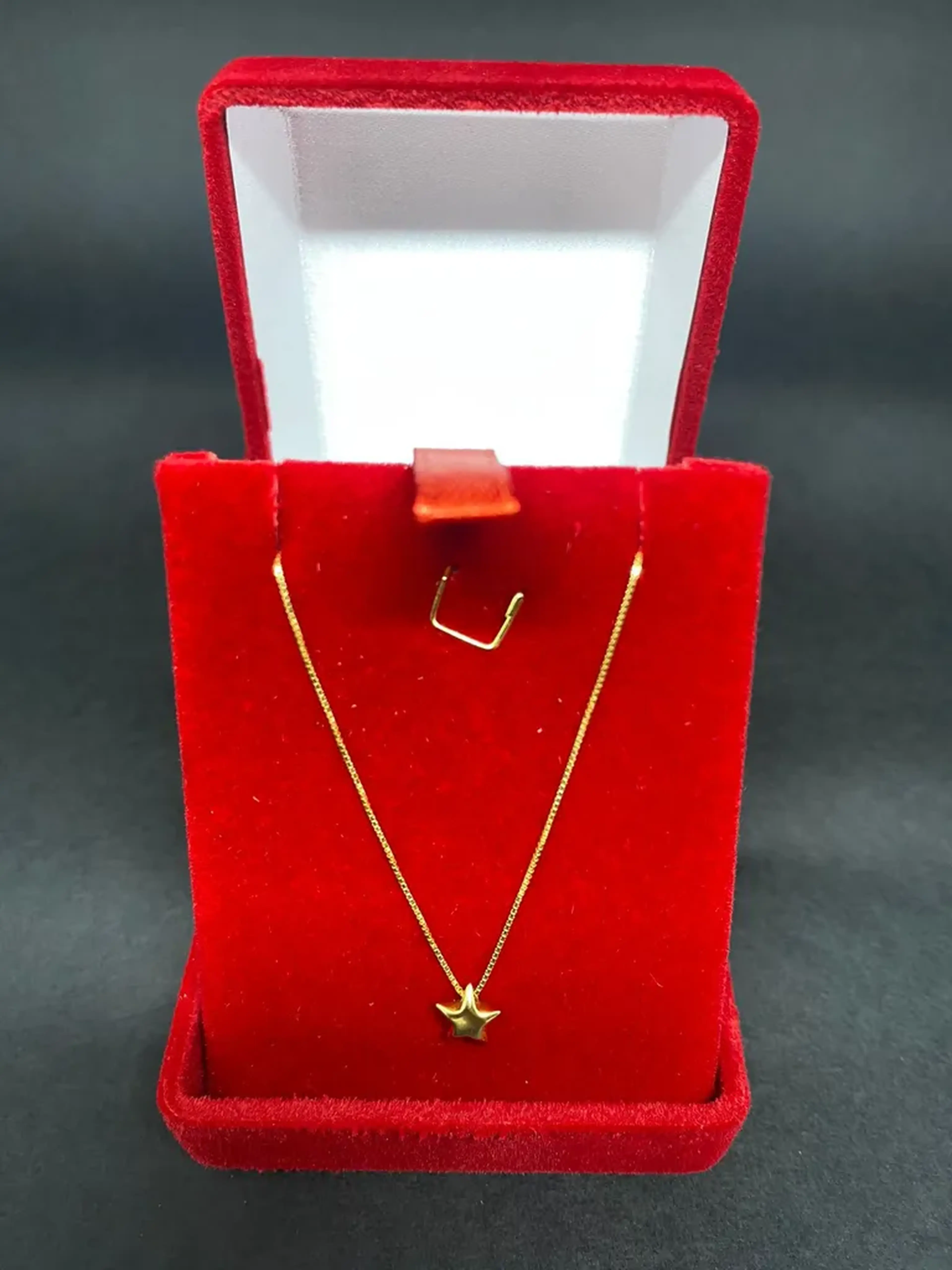 Corrente de ouro 18k 42cm 1,250g com pingente estrela imagem