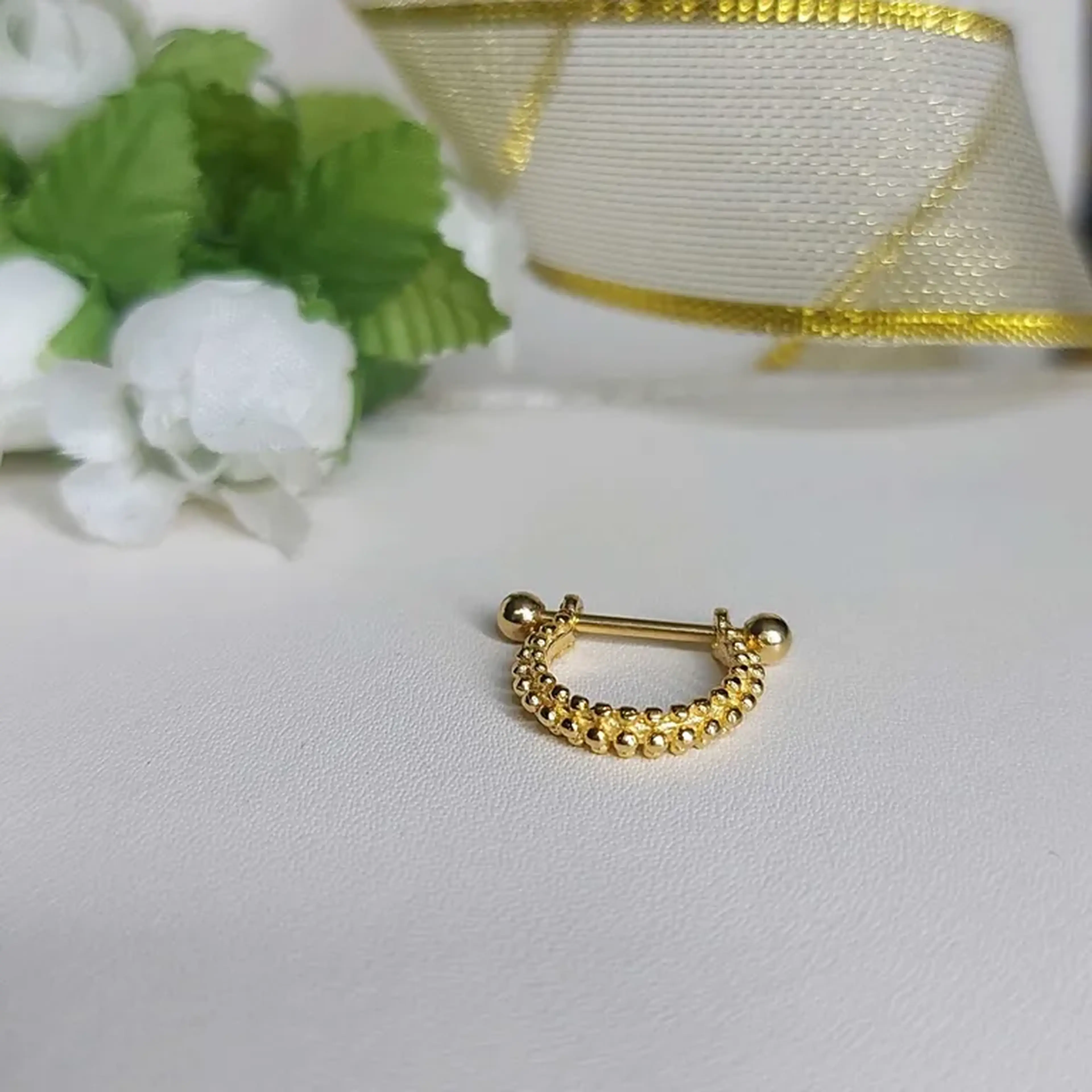 piercing bolinhas auto relevo conch imagem