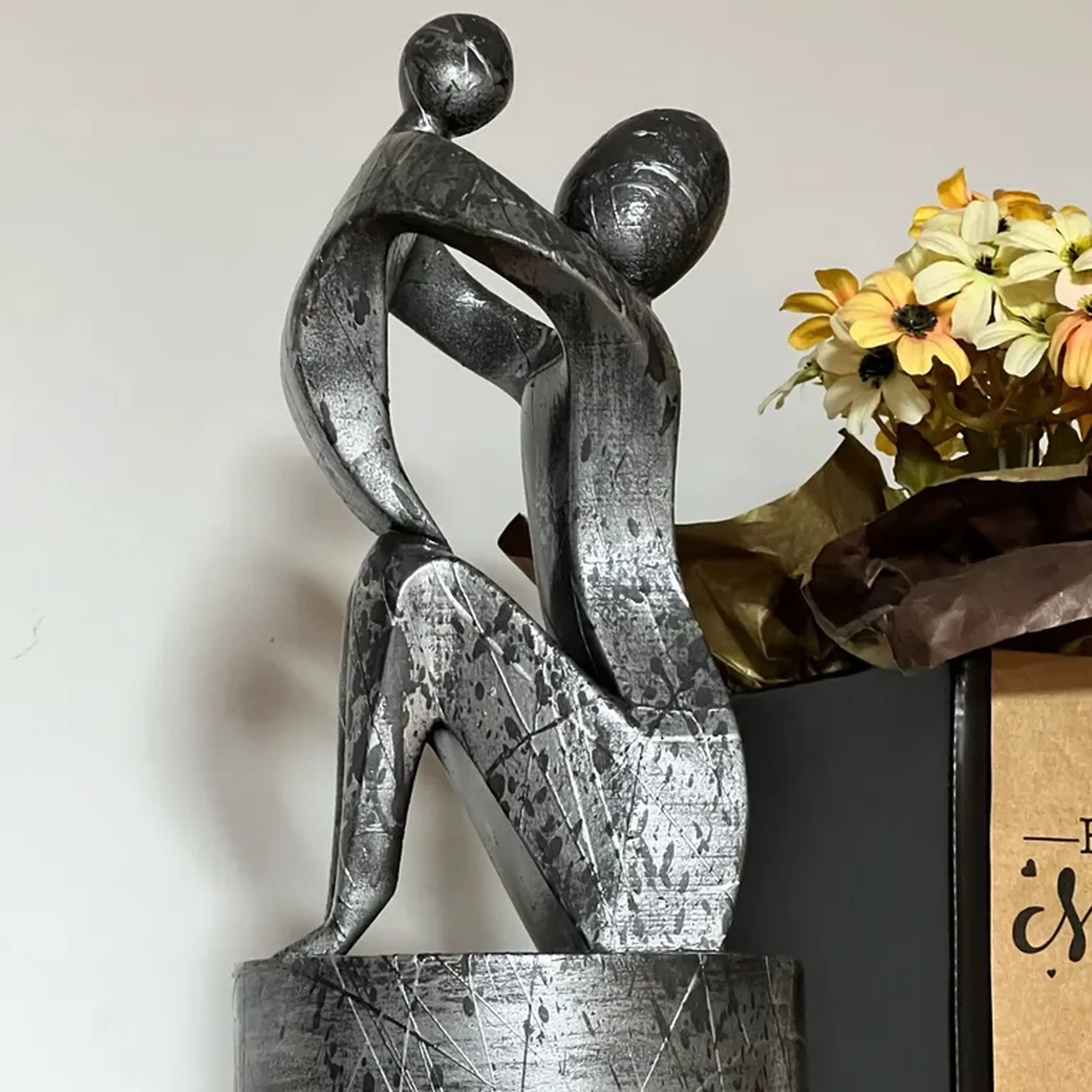 ESCULTURA MÃE E FILHO imagem