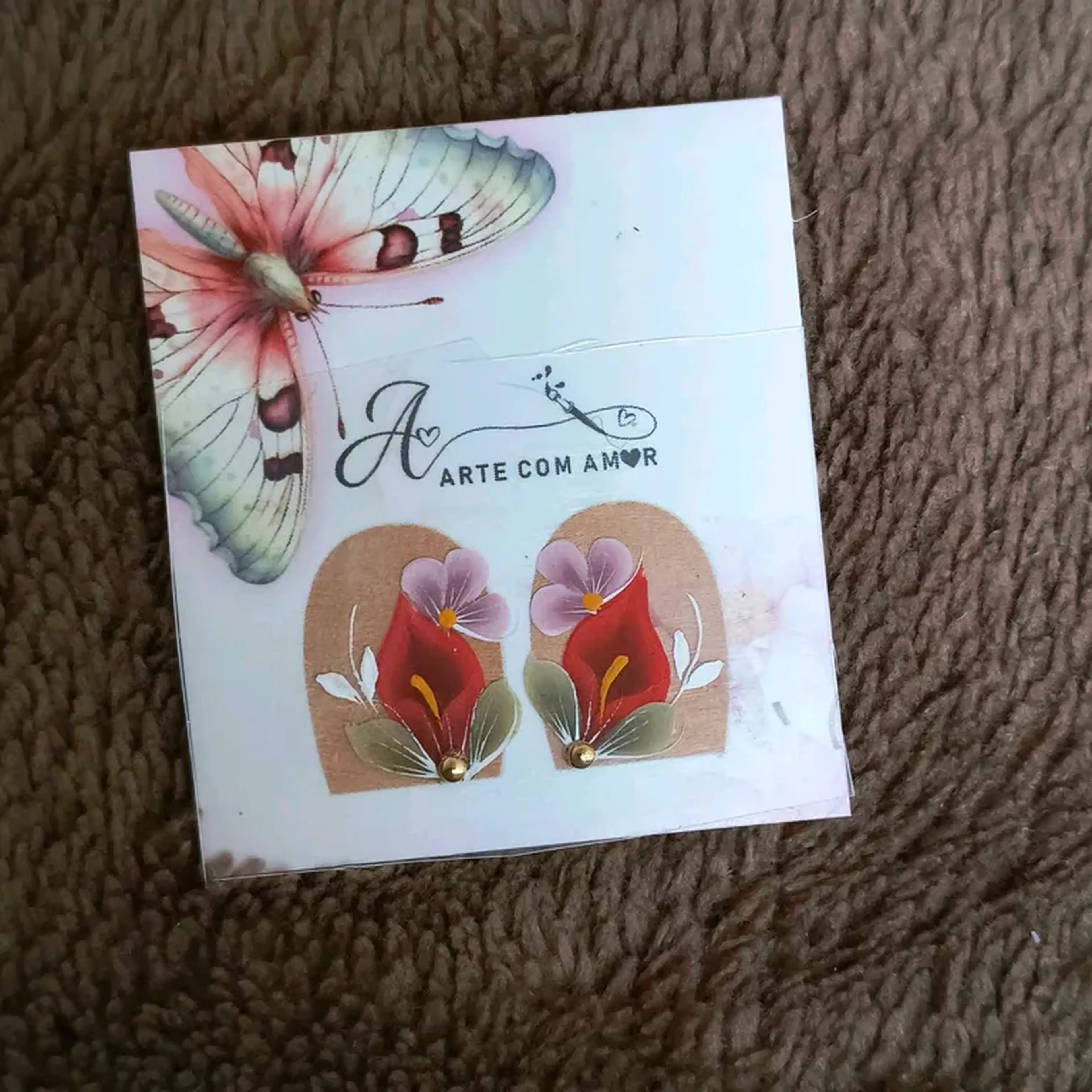 Filha única flor copo de leite vermelho e flor rosa imagem