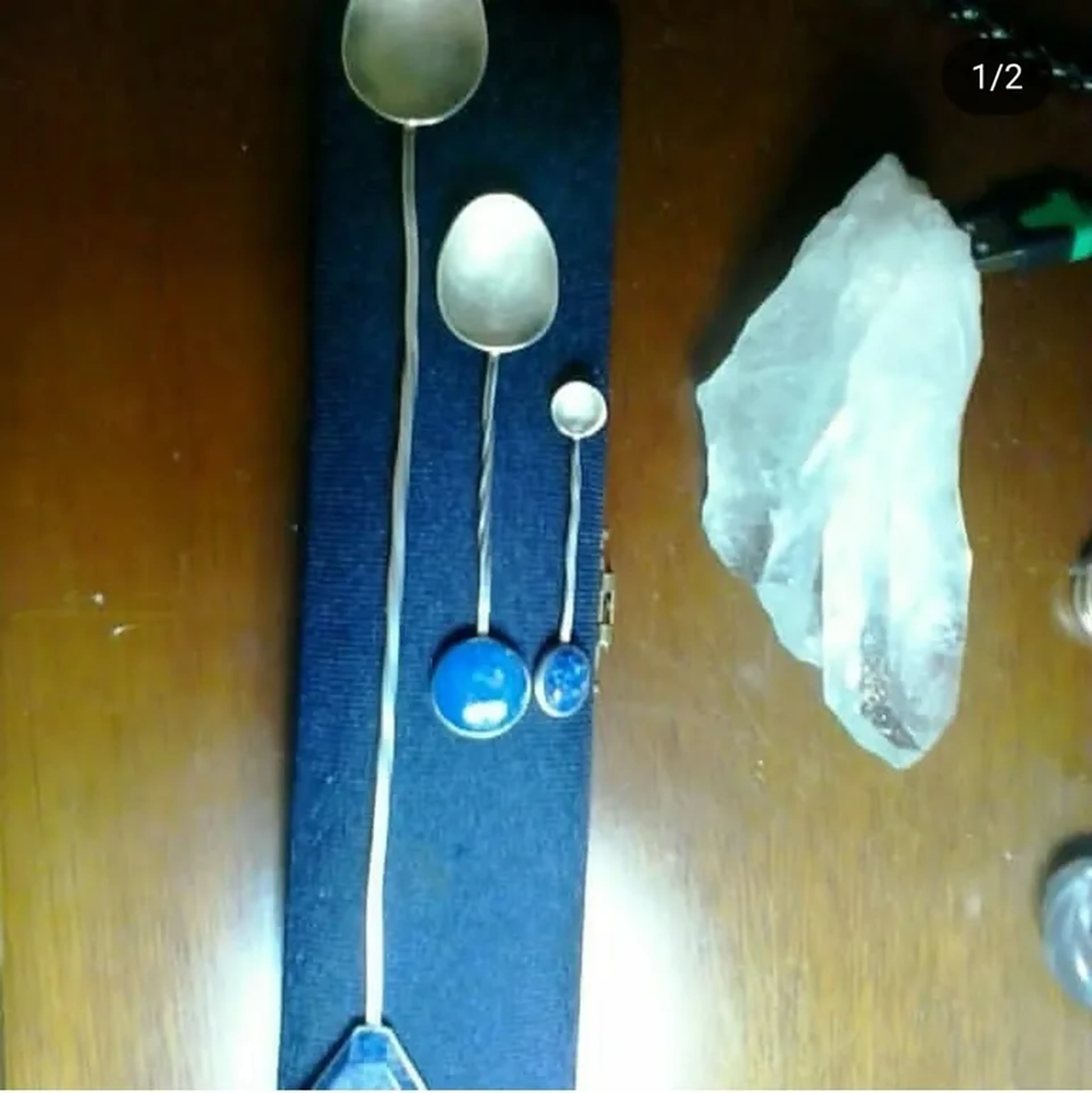 Colheres doadoras em prata e pedraria imagem