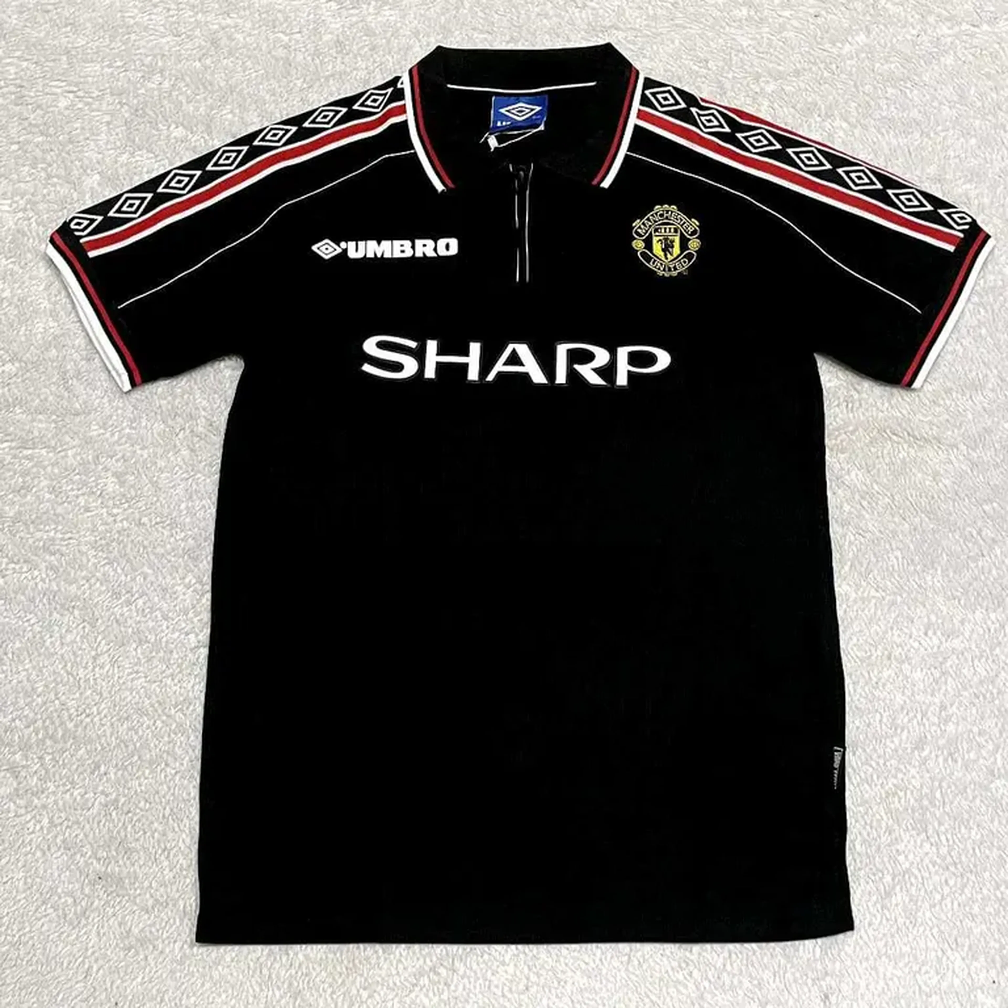 Uniforme Manchester United retrô imagem