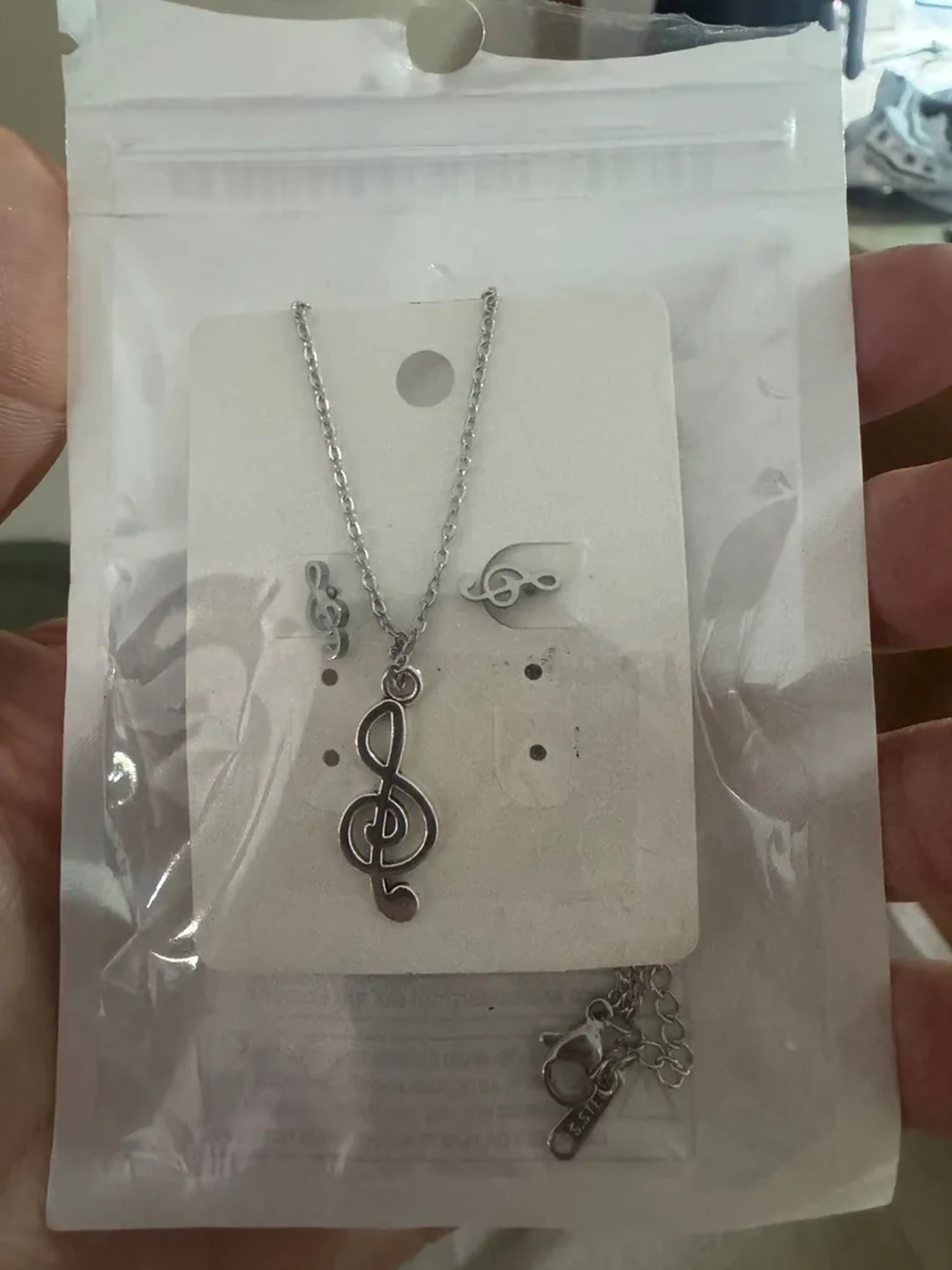 Cordão, pingente e brinco clave de sol imagem