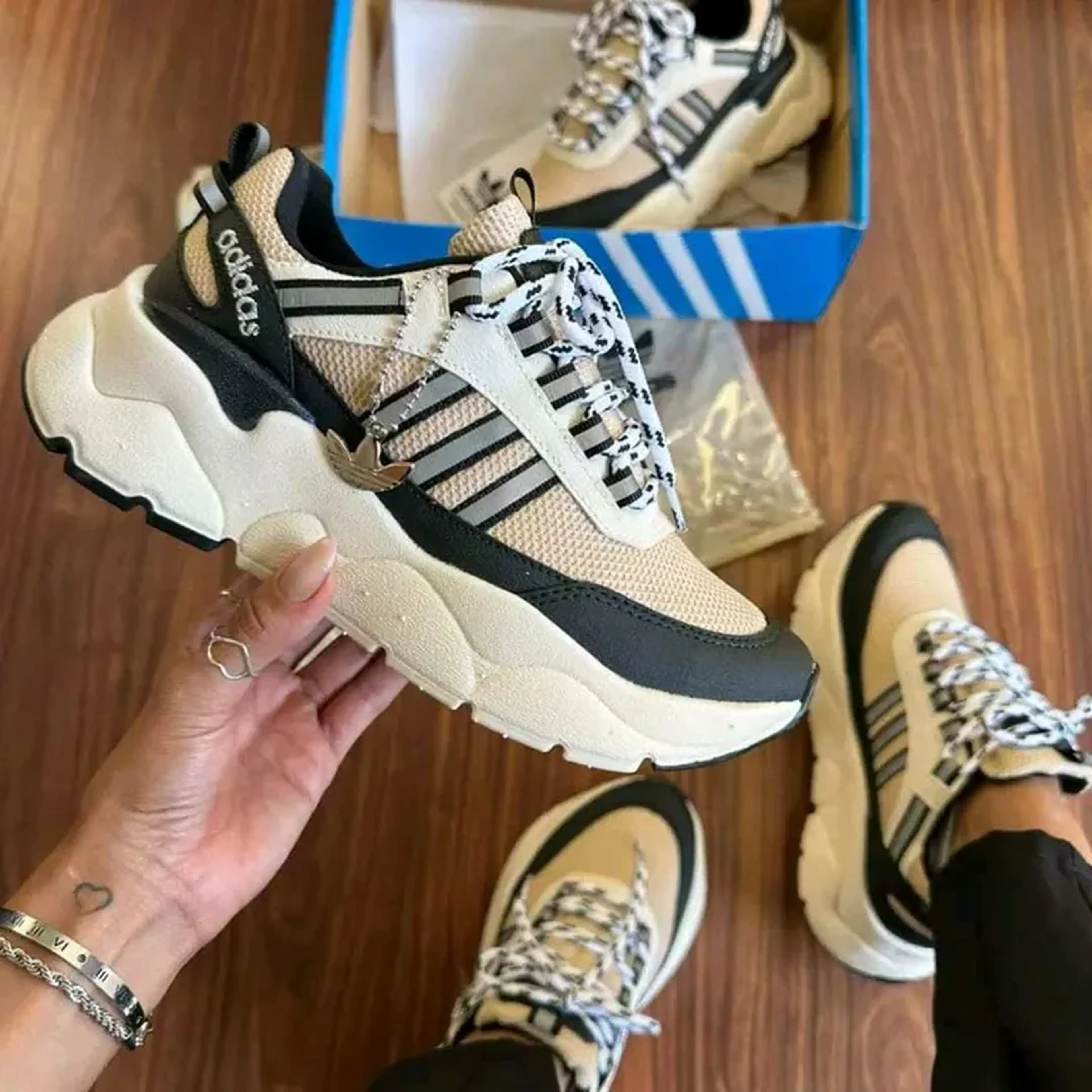 tênis Adidas femmy imagem
