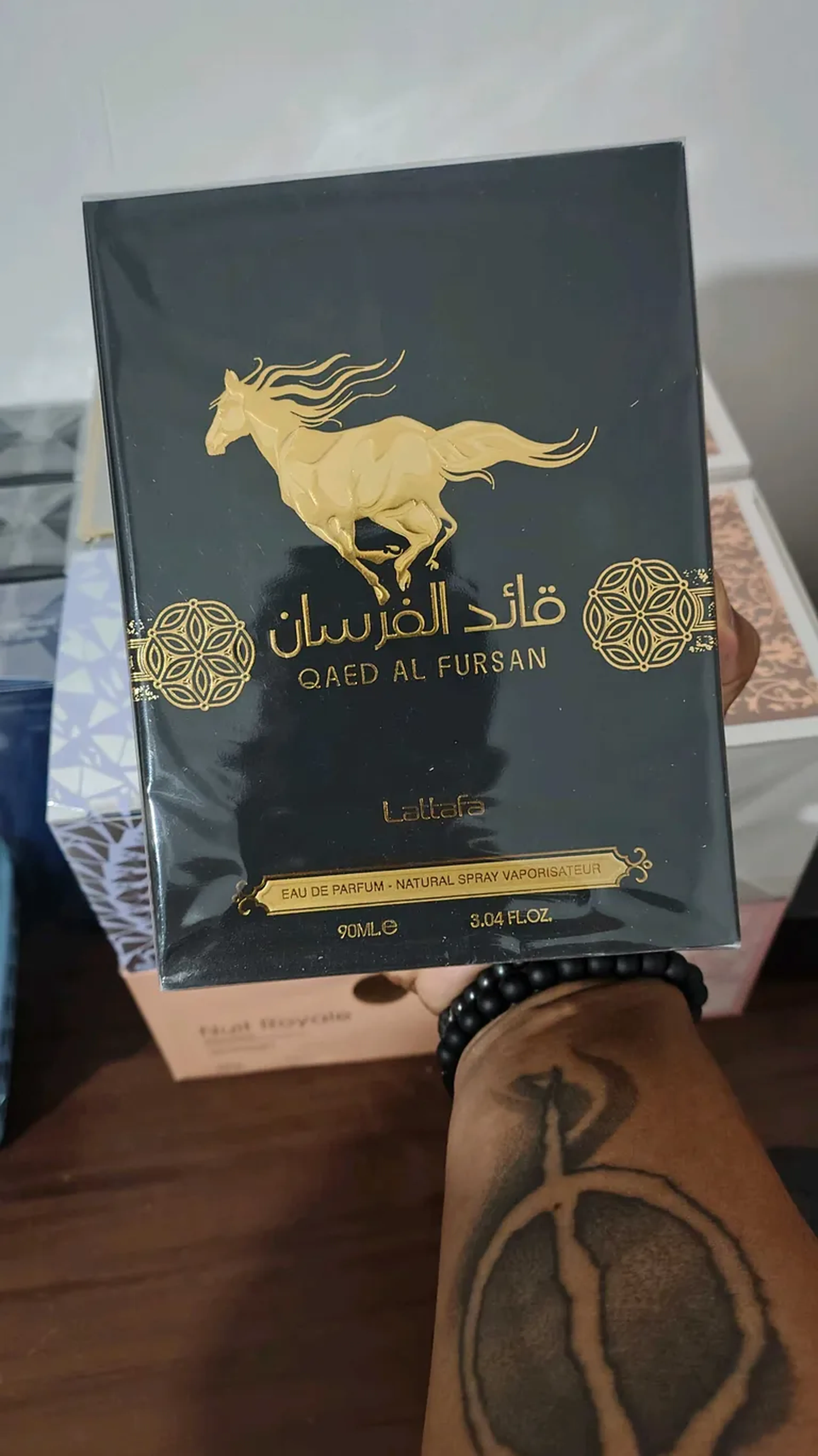 Perfume Qaed Al Fursan imagem