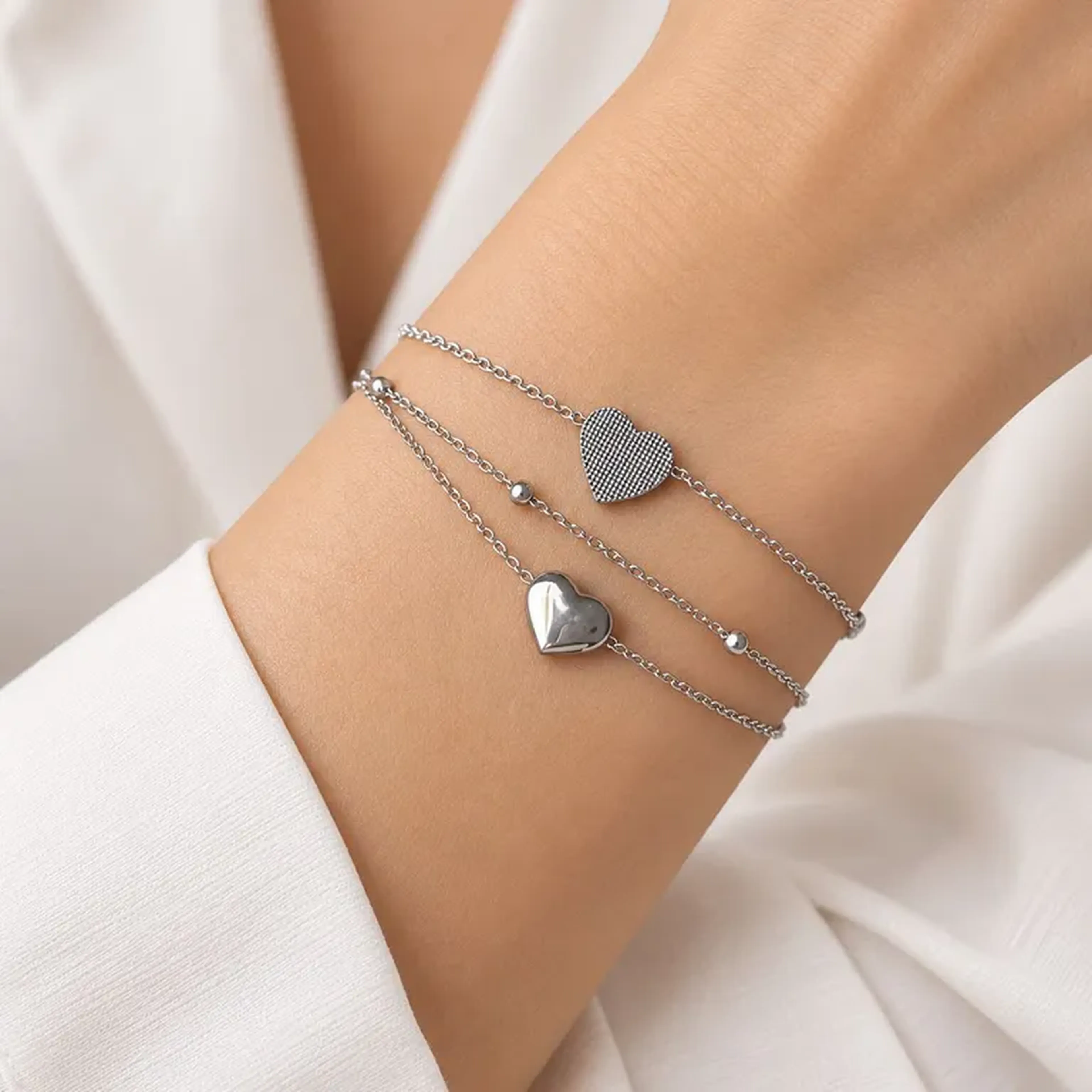 Três pulseiras - Aço inox imagem