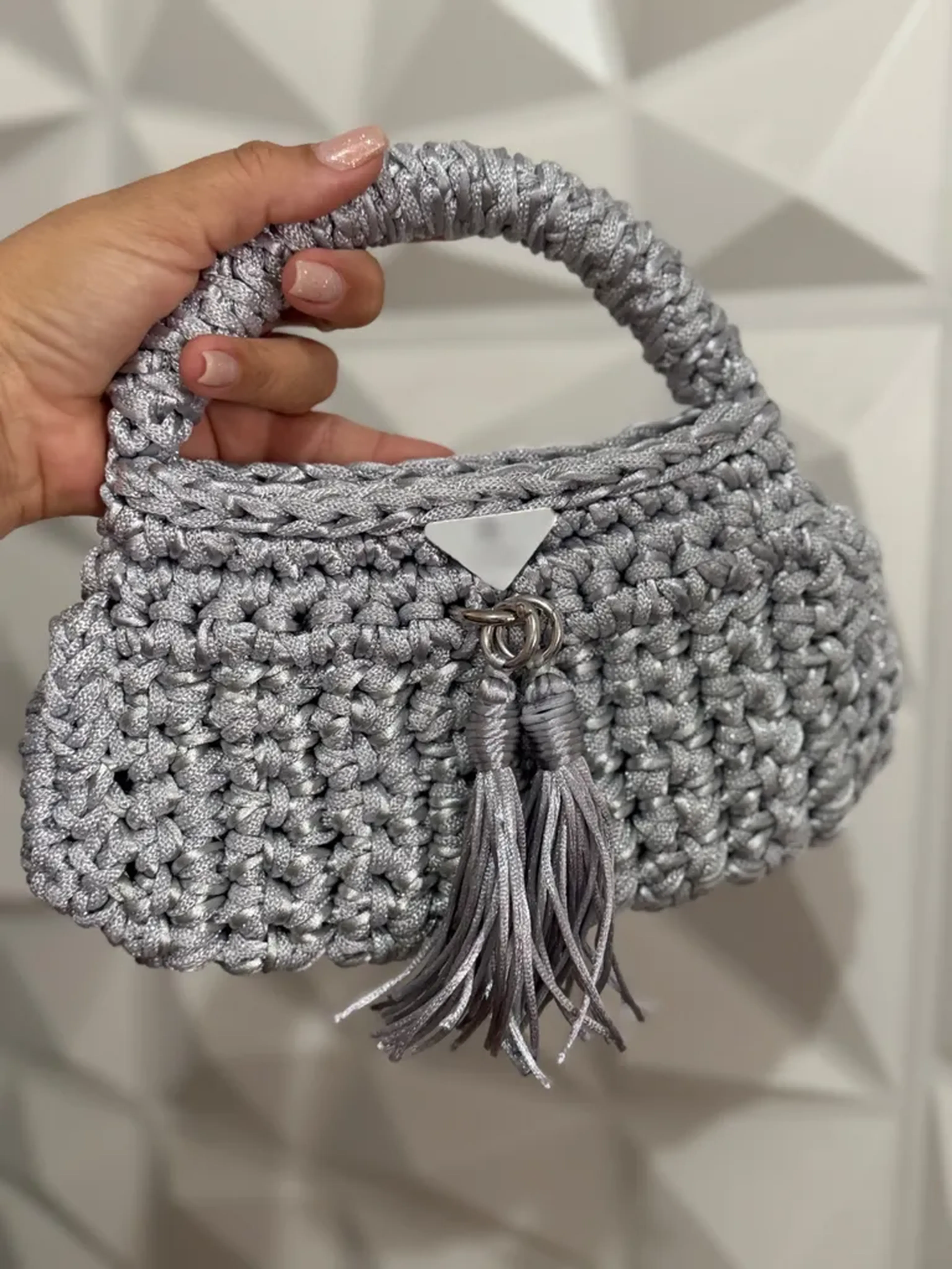 Bolsa de mao prata imagem