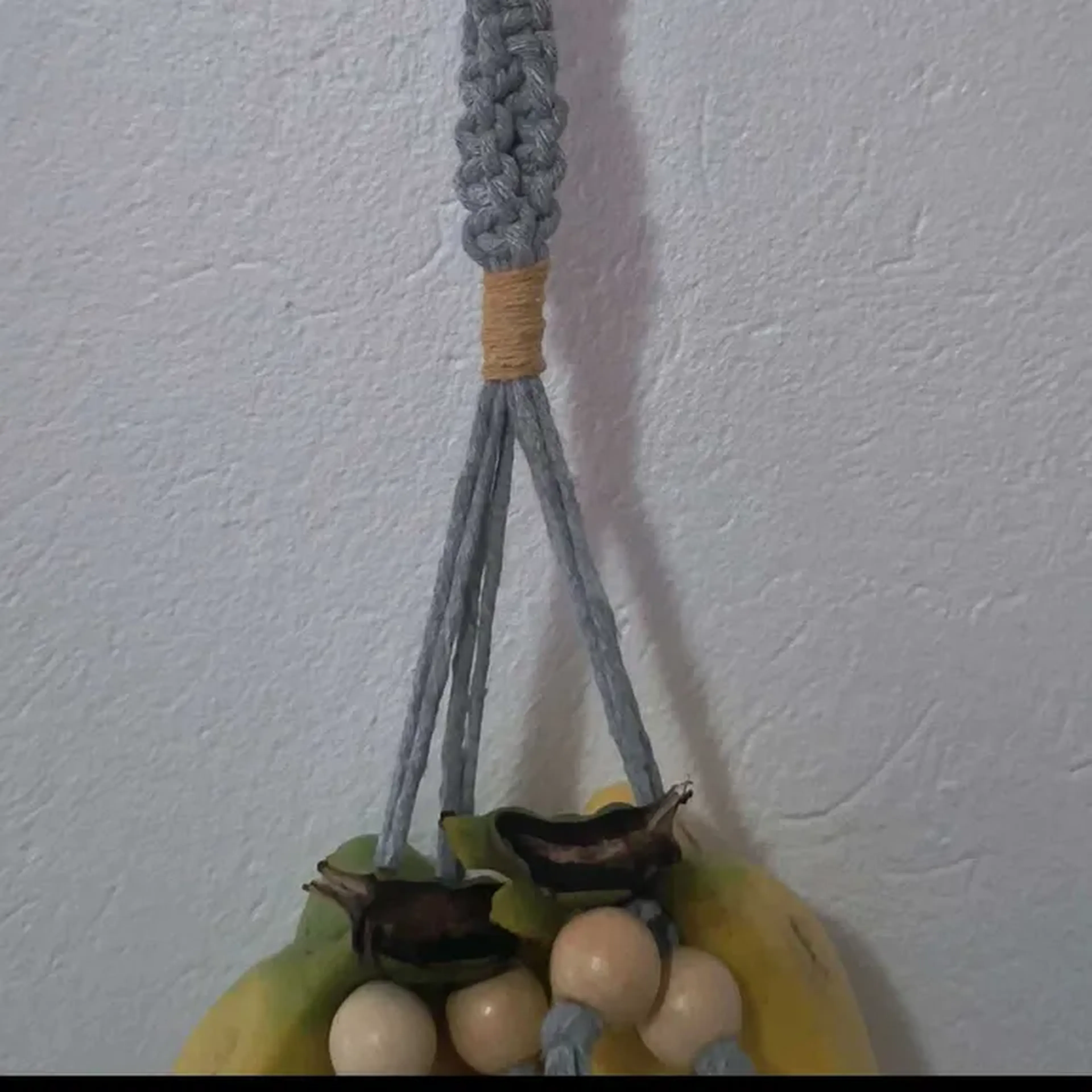 Suporte de bananas trançado imagem