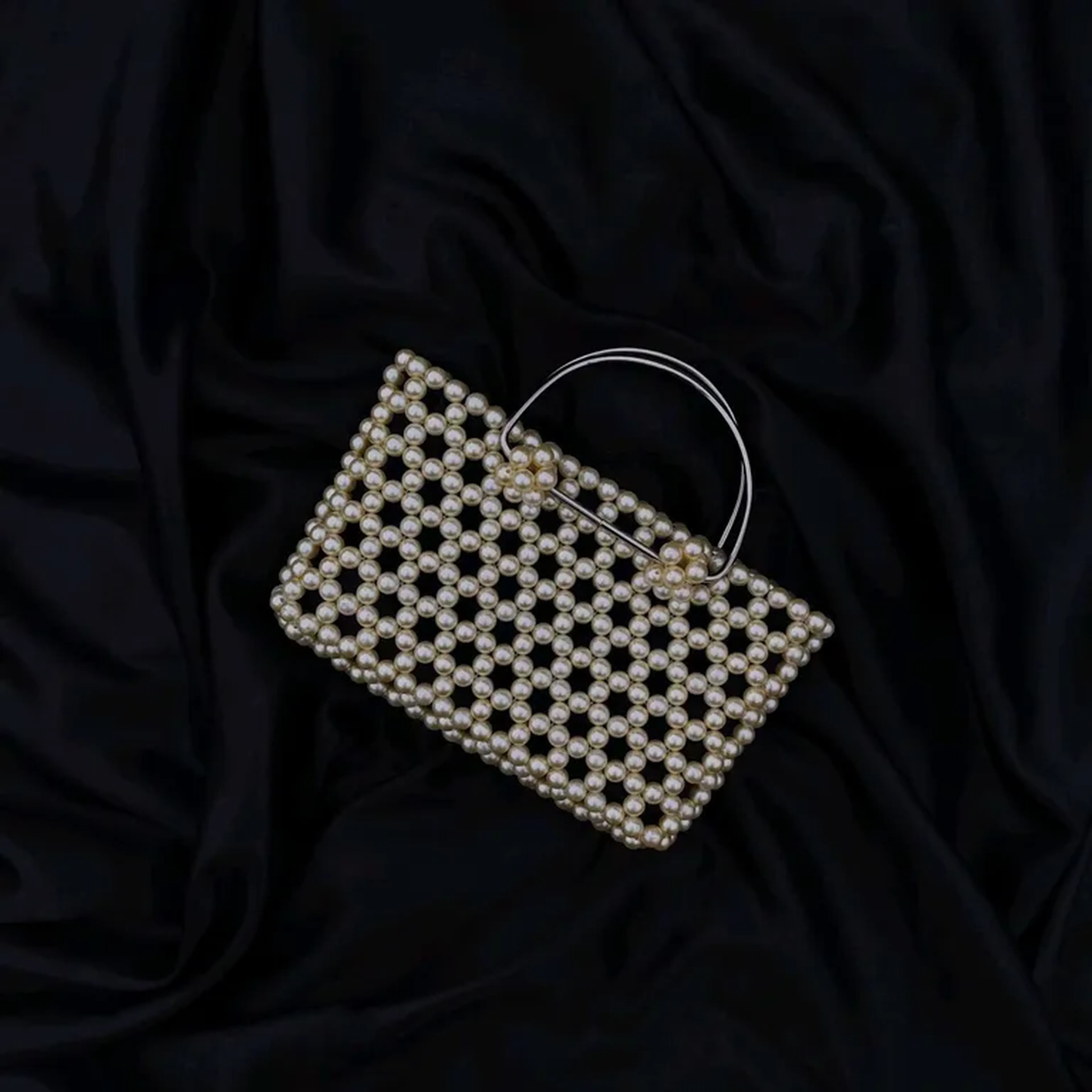 Bolsa artesanal perolada imagem