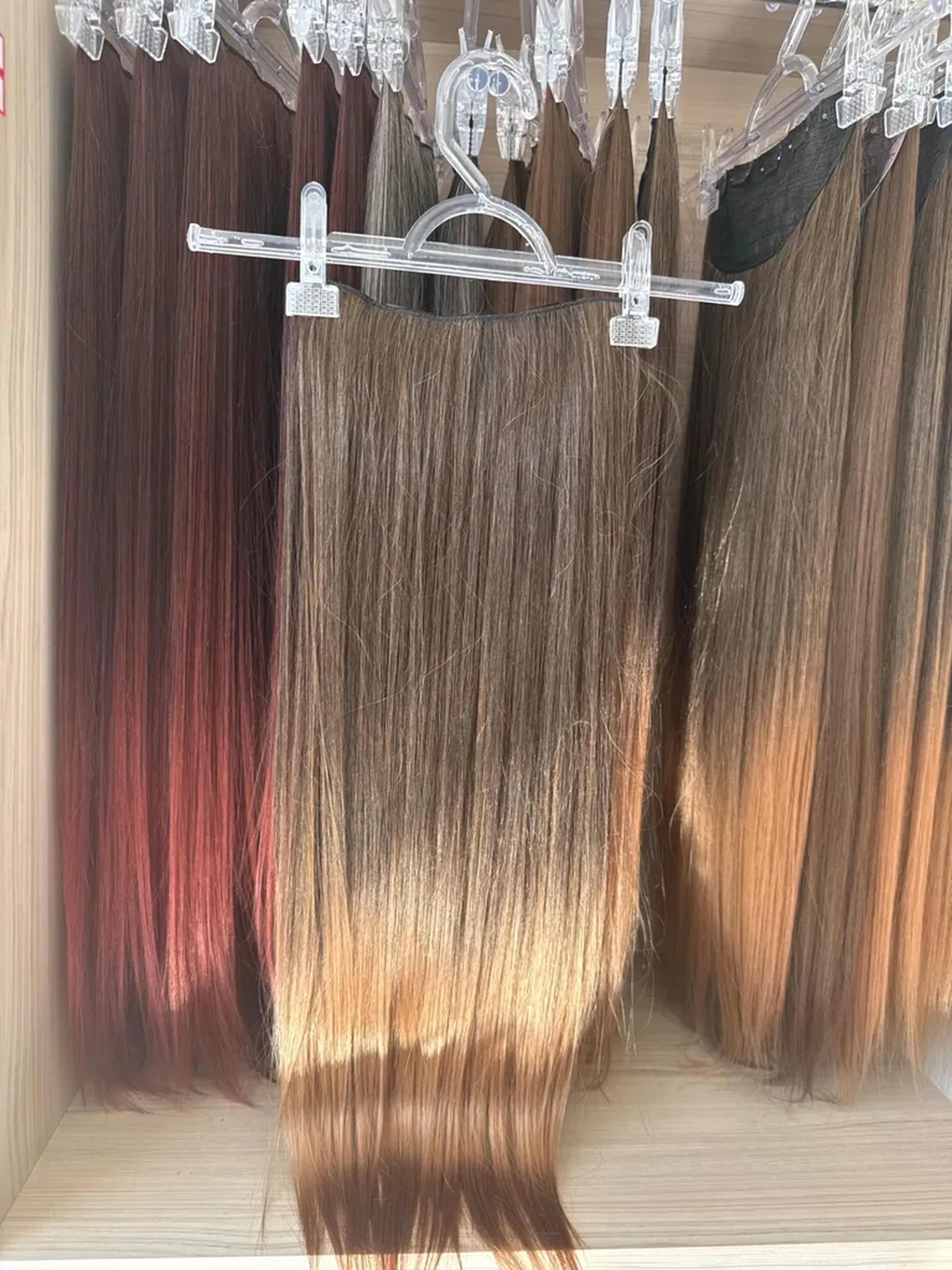 Faixa de cabelo orgânico morena iluminada imagem