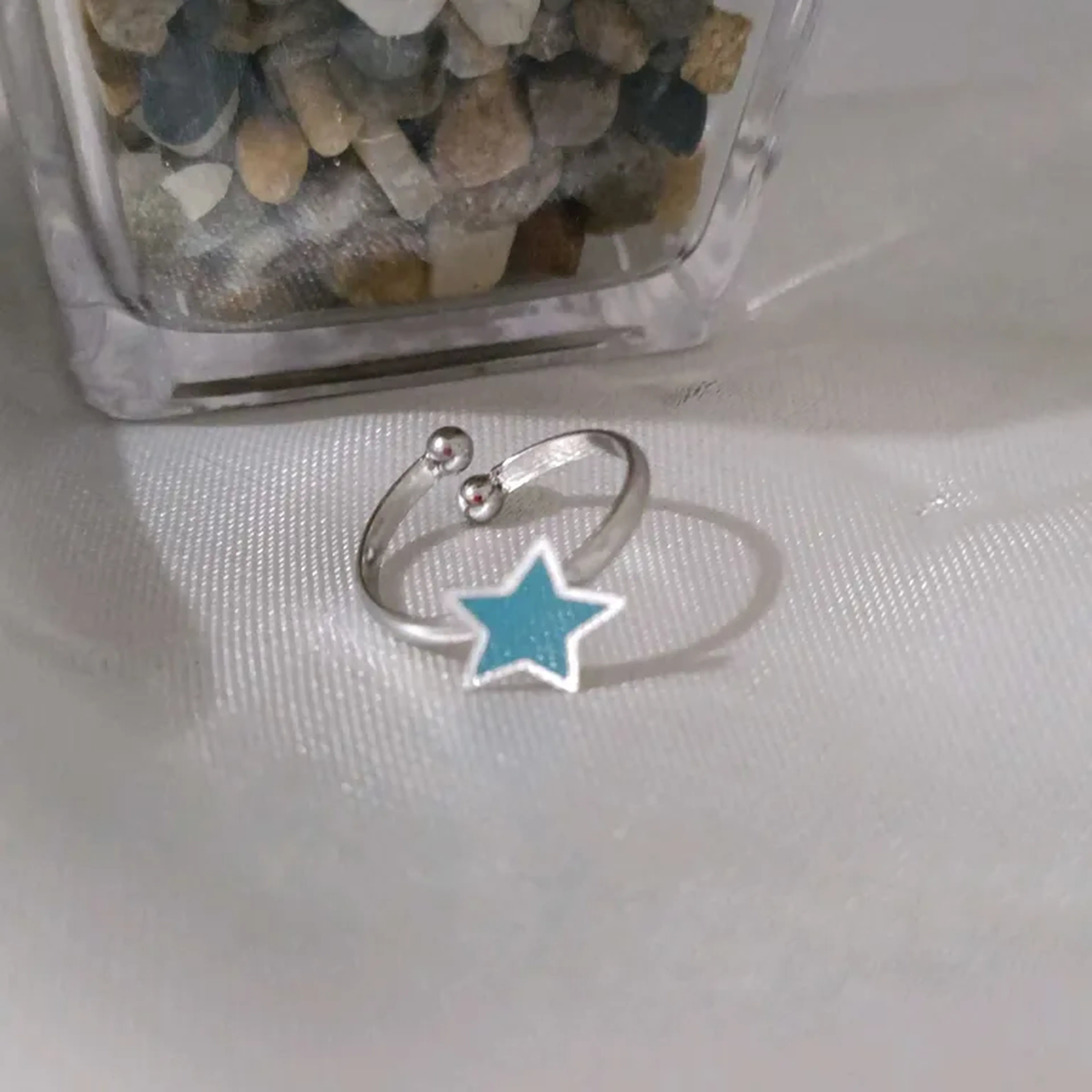 Anel ajustável em aço estrela azul P imagem